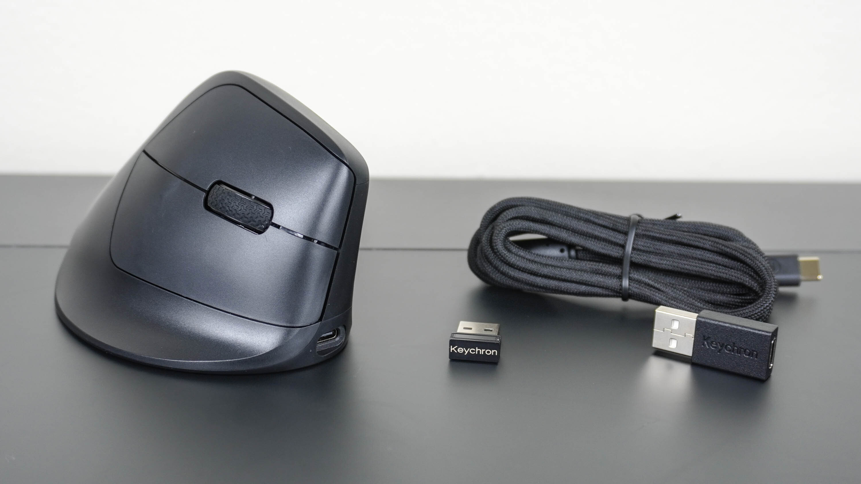 The Keychron M5 vertical mouse unboxed on a desk