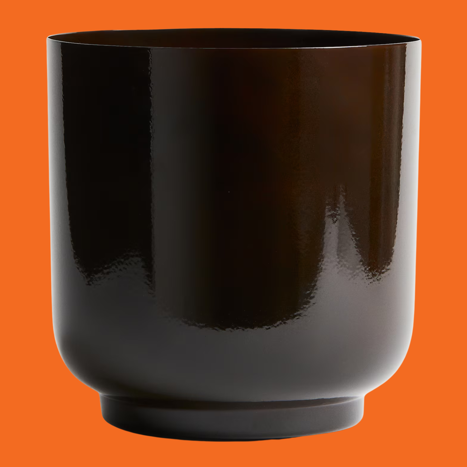 A large brown metal pot