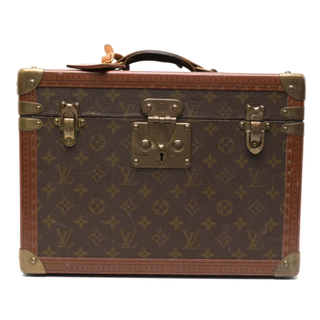 A Louis Vuitton Pharmacie Vanity Case from Farfetch