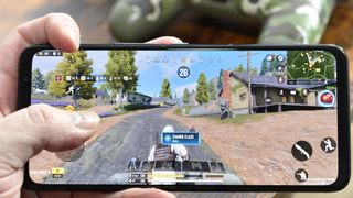 Asus ROG Phone 7 Ultimate with Call of Duty Mobile Battle Royale match on screen