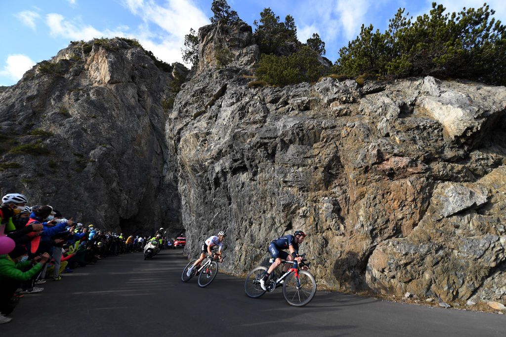LAGHI DI CANCANO ITALY OCTOBER 22 Jai Hindley of Australia and Team Sunweb White Best Young Rider Jersey Tao Geoghegan Hart of The United Kingdom and Team INEOS Grenadiers Torri di Fraele 1938m Fans Public during the 103rd Giro dItalia 2020 Stage 18 a 207km stage from Pinzolo to Laghi di Cancano Parco Nazionale dello Stelvio 1945m girodiitalia Giro on October 22 2020 in Laghi di Cancano Italy Photo by Tim de WaeleGetty Images