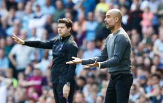 Tottenham Hotspur manager Mauricio Pochettino (left) and Manchester City manager Pep Guardiola on the touchline during the Premier League match at the Etihad Stadium, Manchester