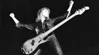 Suzi Quatro performing on stage, United Kingdom, 1974.