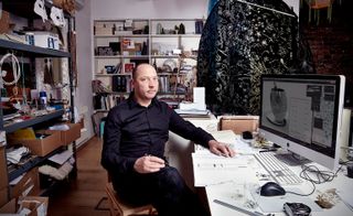 Dutch designer Tord Boontje sitting in studio