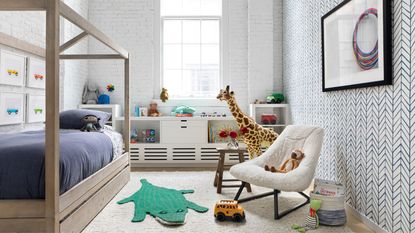 kids room with bed with underbed storage, storage unit and toys