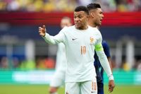 Kylian Mbappe of France gestures 