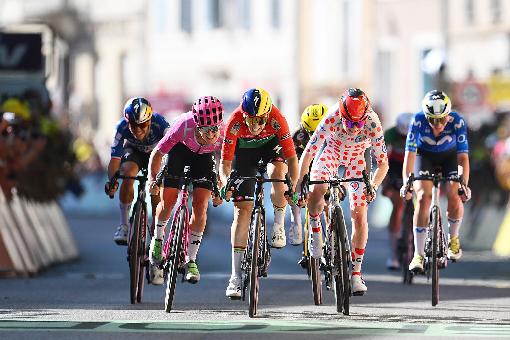 At the front of the final sprint into Tournon-sur-Rhon are (L to R) C&amp;eacute;drine Kerbaol of EF Education - Oatly, stage winner Kim Le Court Pienaar of AG Insurance - Soudal and Puck Pieterse of Fenix - Premier Tech, in the Polka Dot Mountain Jersey