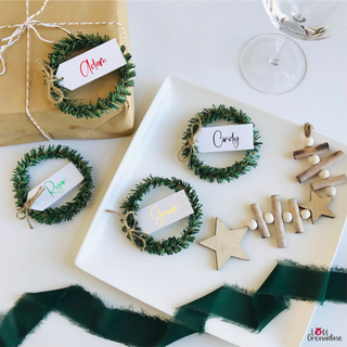 4 miniature Christmas wreaths with table place names