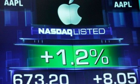 Apple&amp;#039;s soaring share price is shown on a stock ticker on Aug. 21