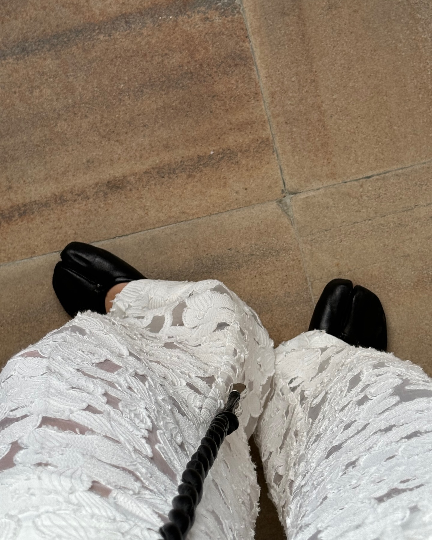 An image of @martynakarolak, wearing one of the most iconic shoes, the Maison Margiela tabis.