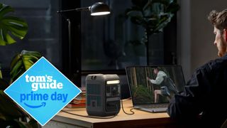 anker solix c300 powering a light and laptop with a prime day deal tag
