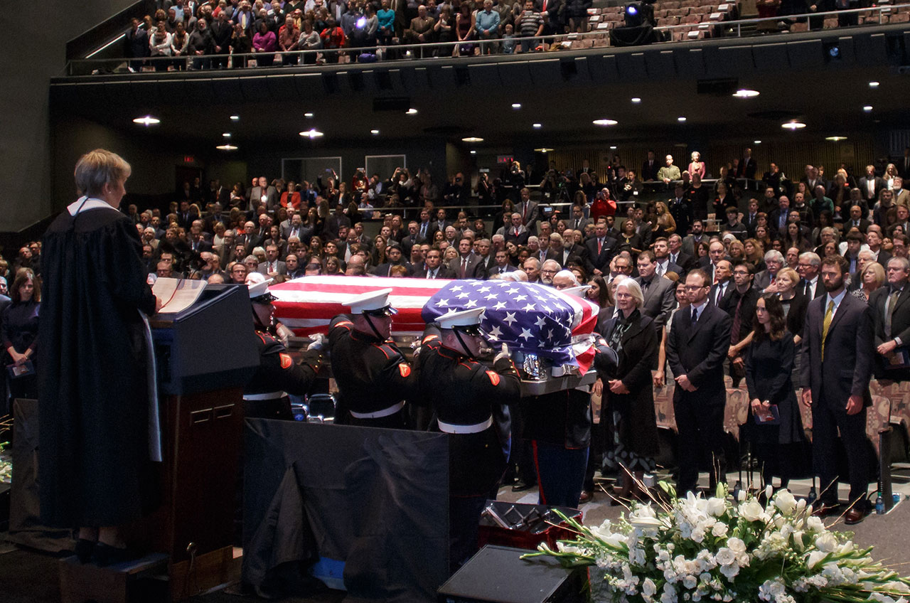 Marines carry in the casket of former astronaut and U.S. Senator John Glenn during a ceremony to celebrate his life, Dec. 17, 2016, at The Ohio State University in Columbus. 