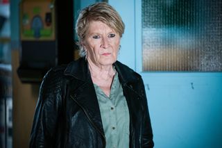 Shirley Carter wearing a black leather jacket in EastEnders 