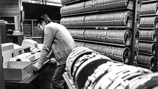 Rolls of magnetic tape storage pictured in a computer room at Lovanio University, Belgium, in the 1970's