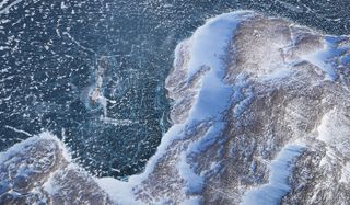 NASA's Operation IceBridge research aircraft spies the Upper Baffin Bay coast on March 27, 2017, above Greenland.
