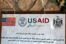 A USAID mural, to commemorate the building of supportive walls and road shoulders, is pictured in the village of al-Badhan, north of Nablus in the occupied West Bank on August 25, 2018. 