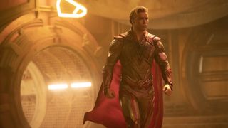 Adam Warlock strides forward from a fiery background in Guardians of the Galaxy 3