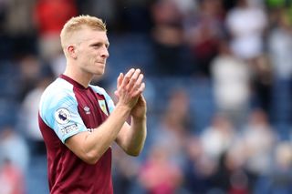 Ben Mee of Burnley applauds the fans following the Premier League match between Burnley and Leeds United at Turf Moor on August 29, 2021 in Burnley, England.