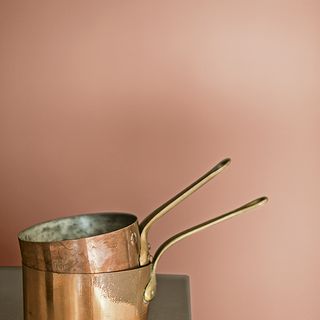 coppery paint wall shade and utensils