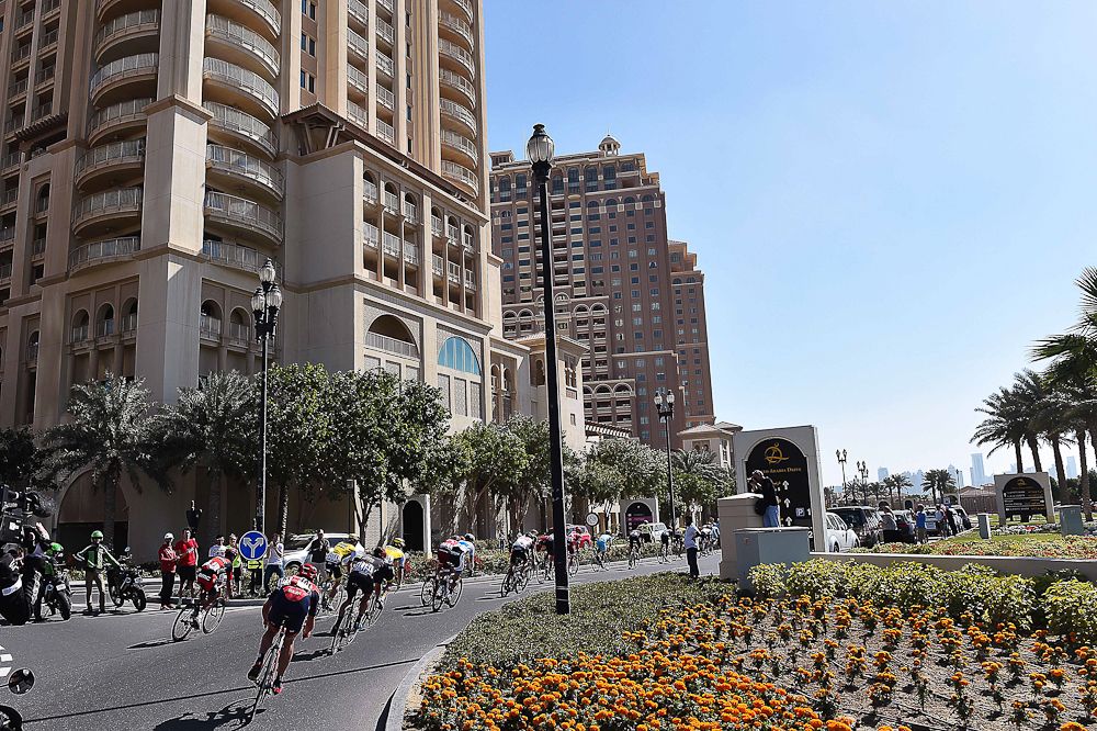 The peloton heads toward Doha City during stage 2 in Qatar