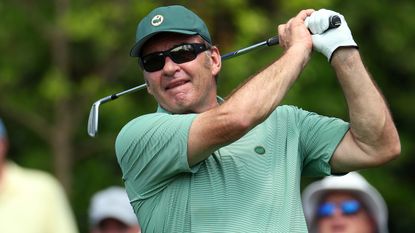 Sir Nick Faldo takes a shot during the 2023 Masters Par 3 Contest