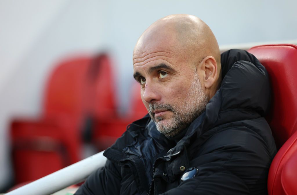 Pep Guardiola, Manager of Manchester City, looks on prior to the Premier League match between Liverpool FC and Manchester City FC at Anfield on December 01, 2024 in Liverpool, England.