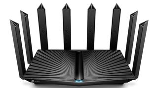 TP-Link Archer AX90 (AX6600) wireless router shown on a white background. The router has a massive eight antennas.