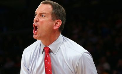 Rutgers' head coach Mike Rice yells his directions court side during a March 12 game.