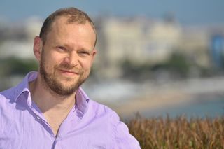 Robert Webb posing in France in 2017