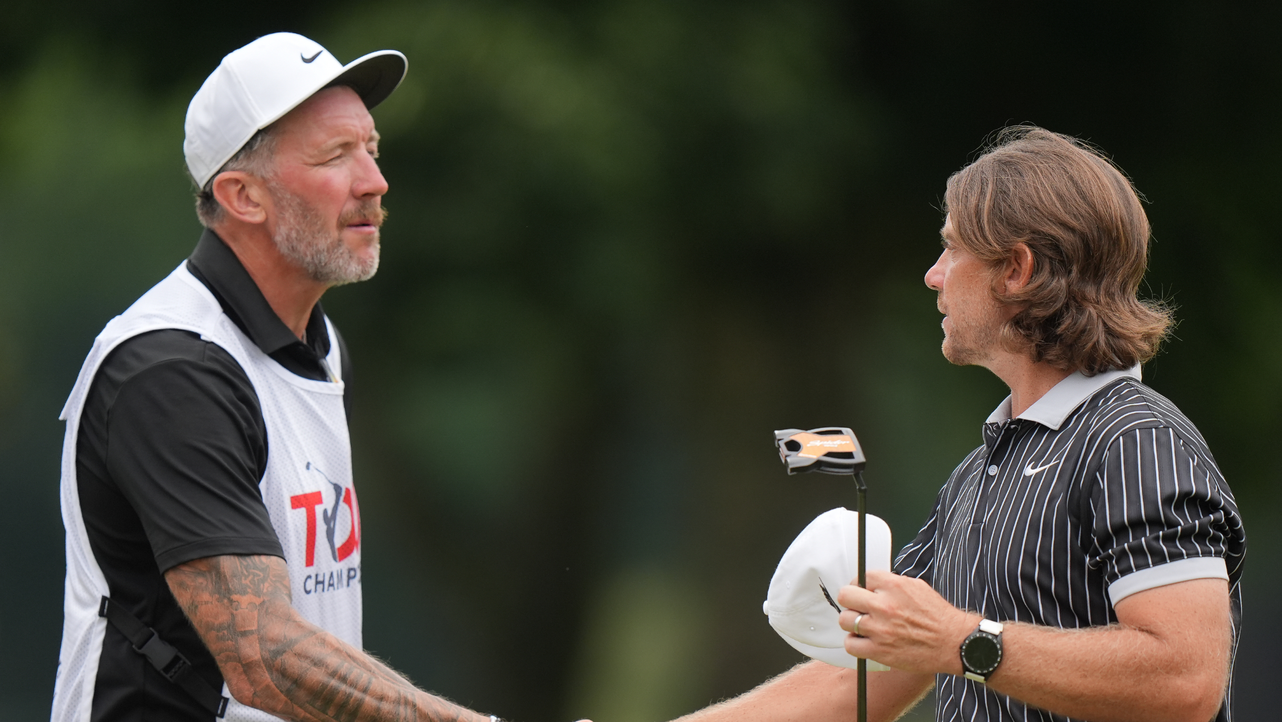 Ian Finnis and Tommy Fleetwood at the Tour Championship