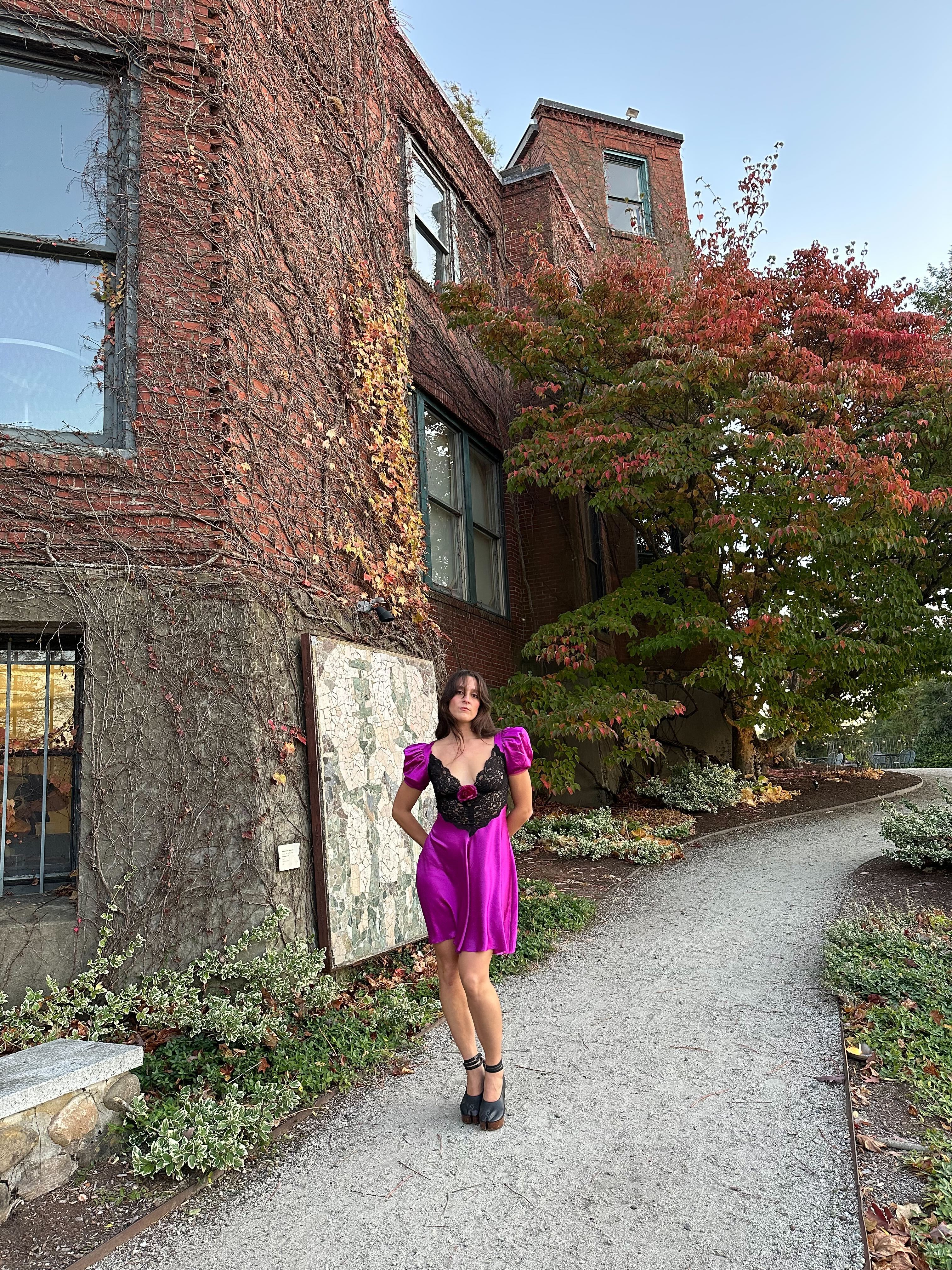 WWW editor wearing a wedding guest dress.