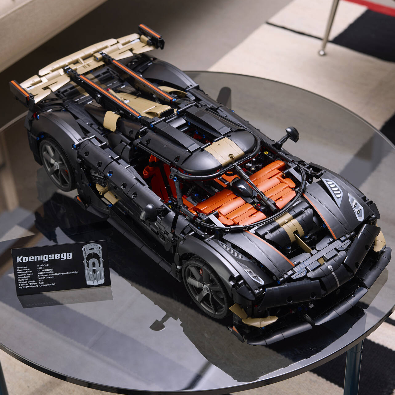 Lego Koenigsegg Sadair's Spear Megacar on a glass coffee table