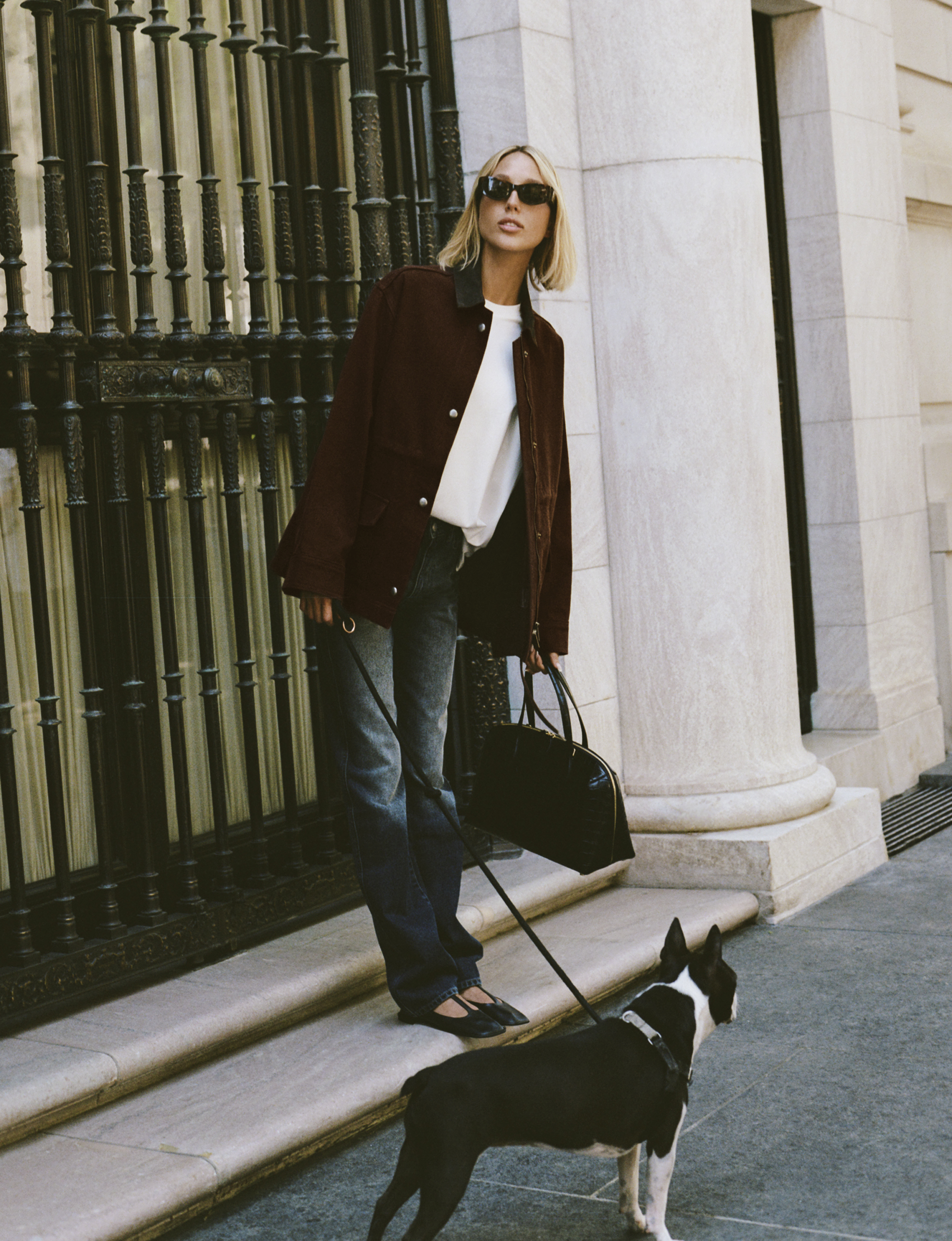 Princess Olympia in a barn jacket and dark-wash jeans for the Moda Operandi x DL1961 campaign