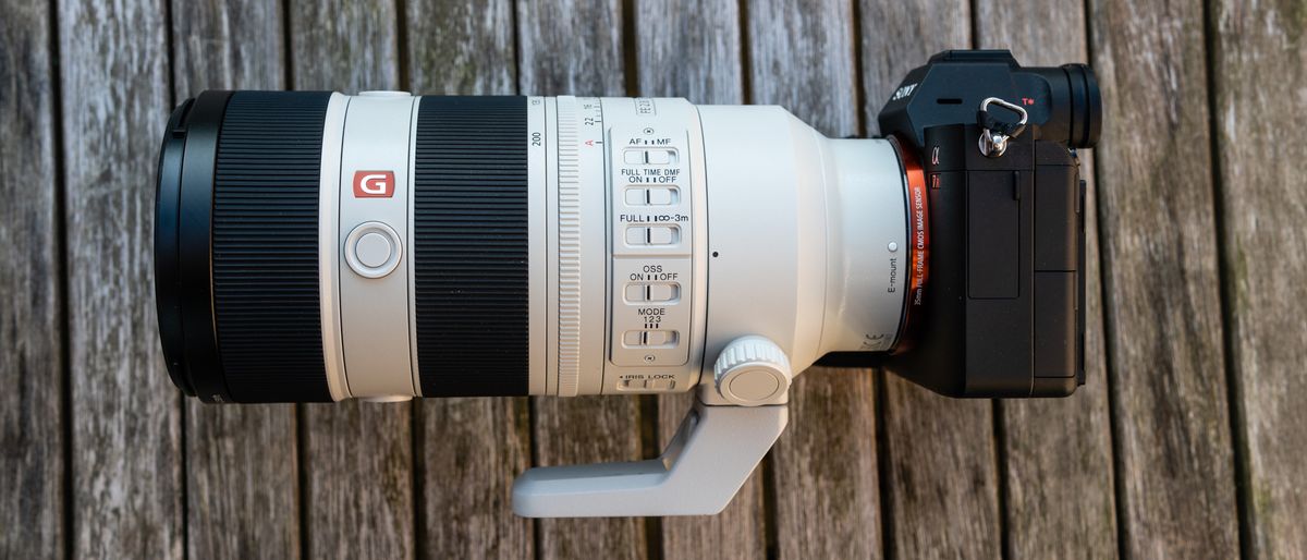 The Sony FE 70-200mm F2.8 GM OSS II lens on a wooden table