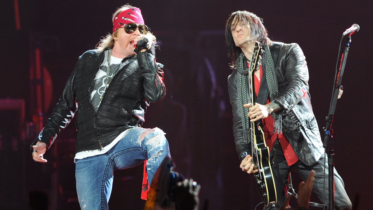 Axl Rose and Richard Fortus of Guns N&#039; Roses perform at BankAtlantic Center on October 24, 2011 in Sunrise, Florida