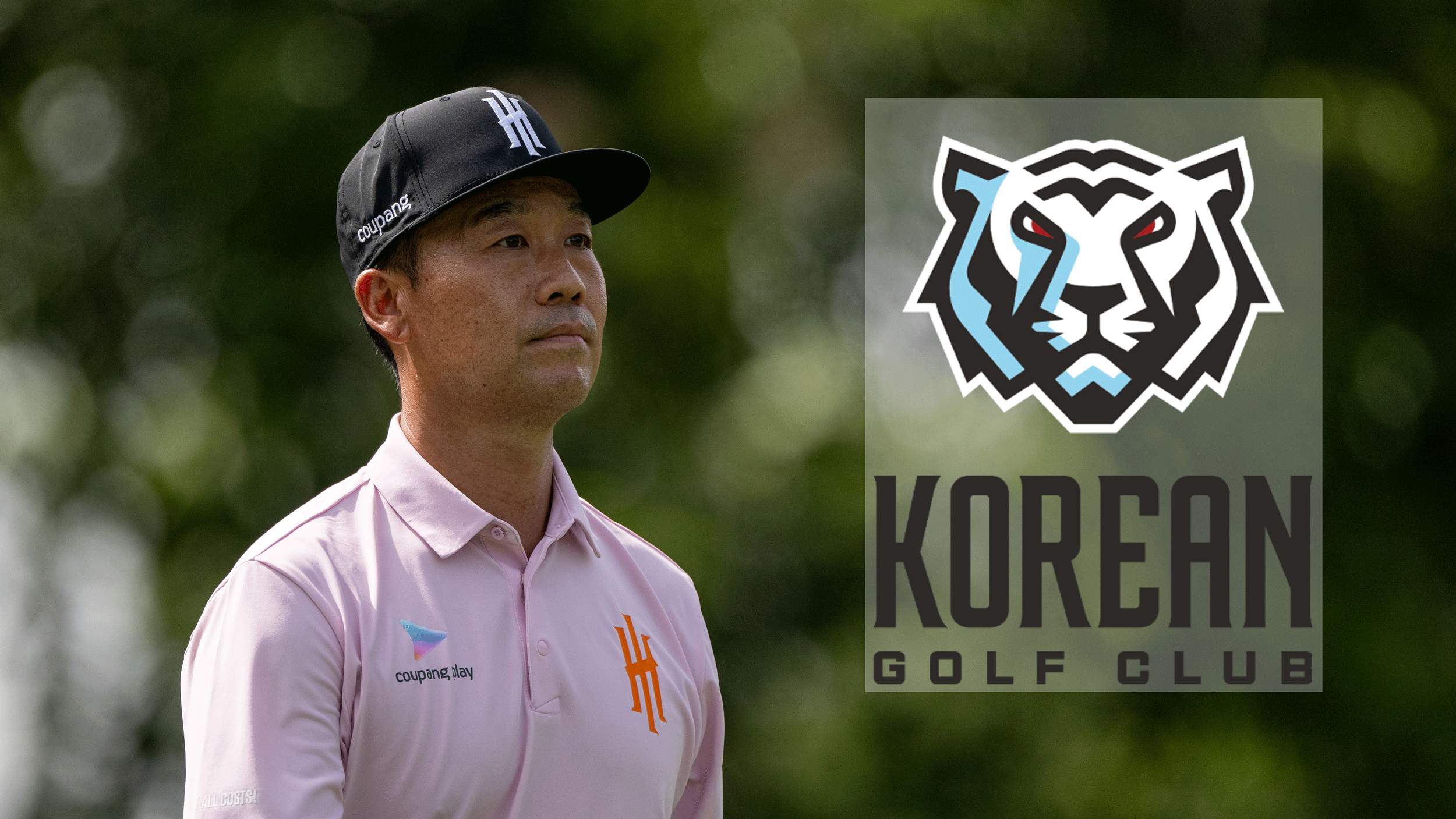 Kevin Na walks along while wearing an Iron Heads GC polo and cap with a large Korean GC badge on the right side of the image