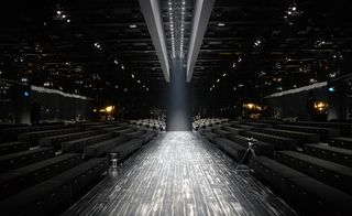 The Gucci venue featured a black parquet catwalk and black velvet seats