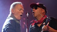 Bruce Springsteen and Tom Morello sharing a microphone