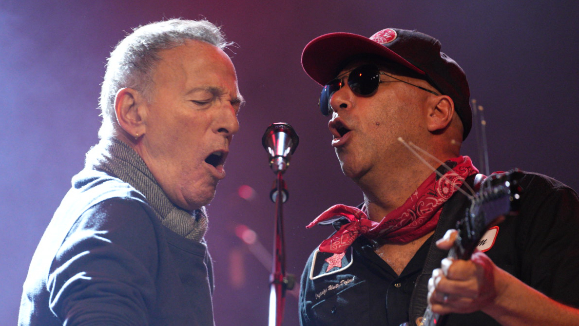 Bruce Springsteen and Tom Morello sharing a microphone