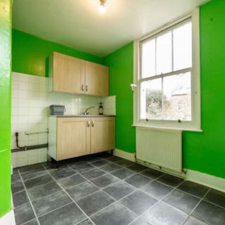 lime green upstairs kitchen before bathroom makeover