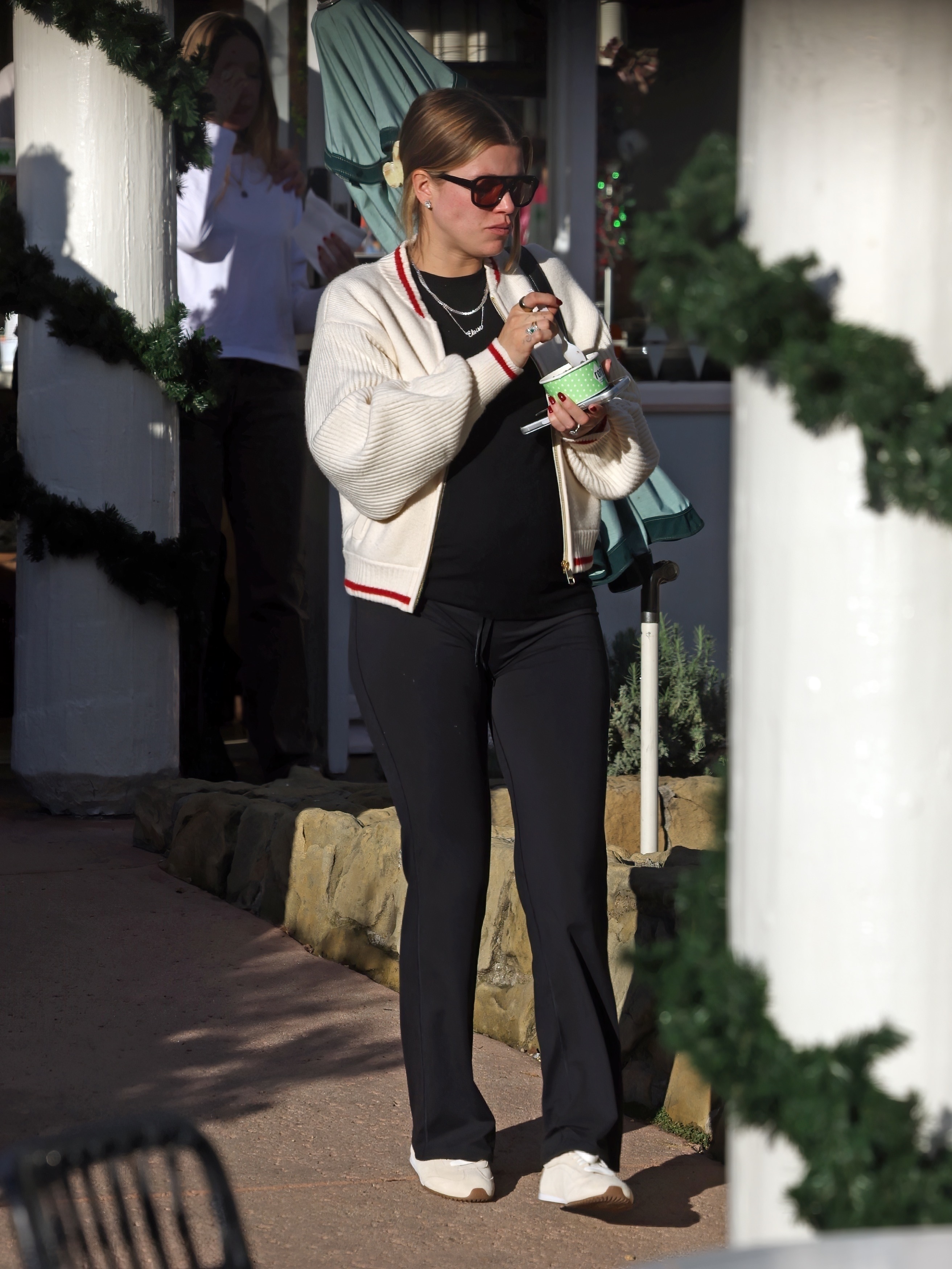The glowing mom-to-be Sofia Richie, husband Elliot Grainge, and their adorable daughter Eloise share a delightful treat at Rori's Ice Cream in the upscale beach town of Montecito, CA&amp;mdash;celebrating their new life following the purchase of a luxurious $10 million mansion.