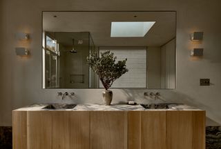 A bathroom with space-saving vanity unit