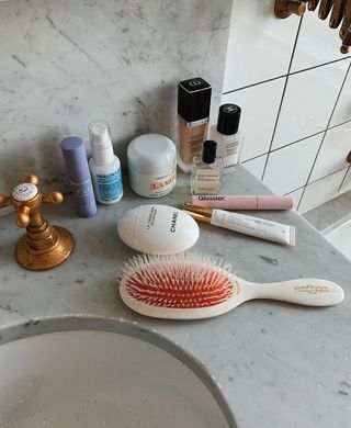 Beauty products on a vanity.