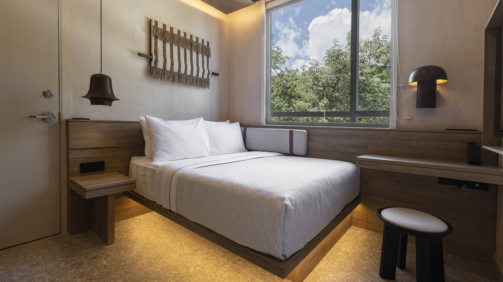 Una cama en el hotel lema by Hilton Tulum y retiro para dormir