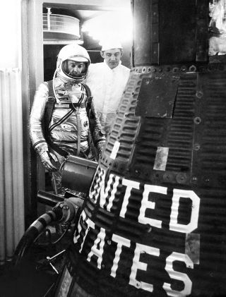 Alan Shepard, wearing his silvery pressure suit, prepares to climb aboard his Mercury capsule Freedom 7 prior to his launch on the first U.S. human spaceflight, 60 years ago on May 5, 1961.