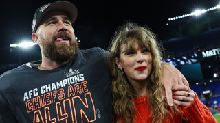 Travis Kelce #87 of the Kansas City Chiefs (L) celebrates with Taylor Swift after defeating the Baltimore Ravens in the AFC Championship Game at M&T Bank Stadium on January 28, 2024 