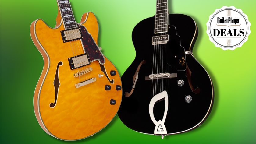 A D&#039;Angelico semi hollow guitar and Guild hollowbody guitar on a green background
