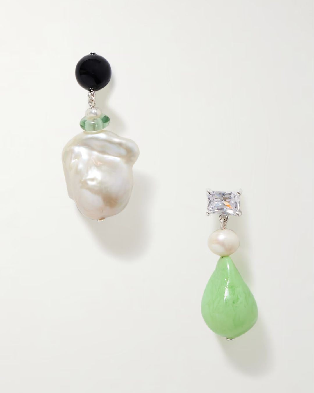 Completed works Bio-resin, recycled silver, cubic zirconia and pearl earrings