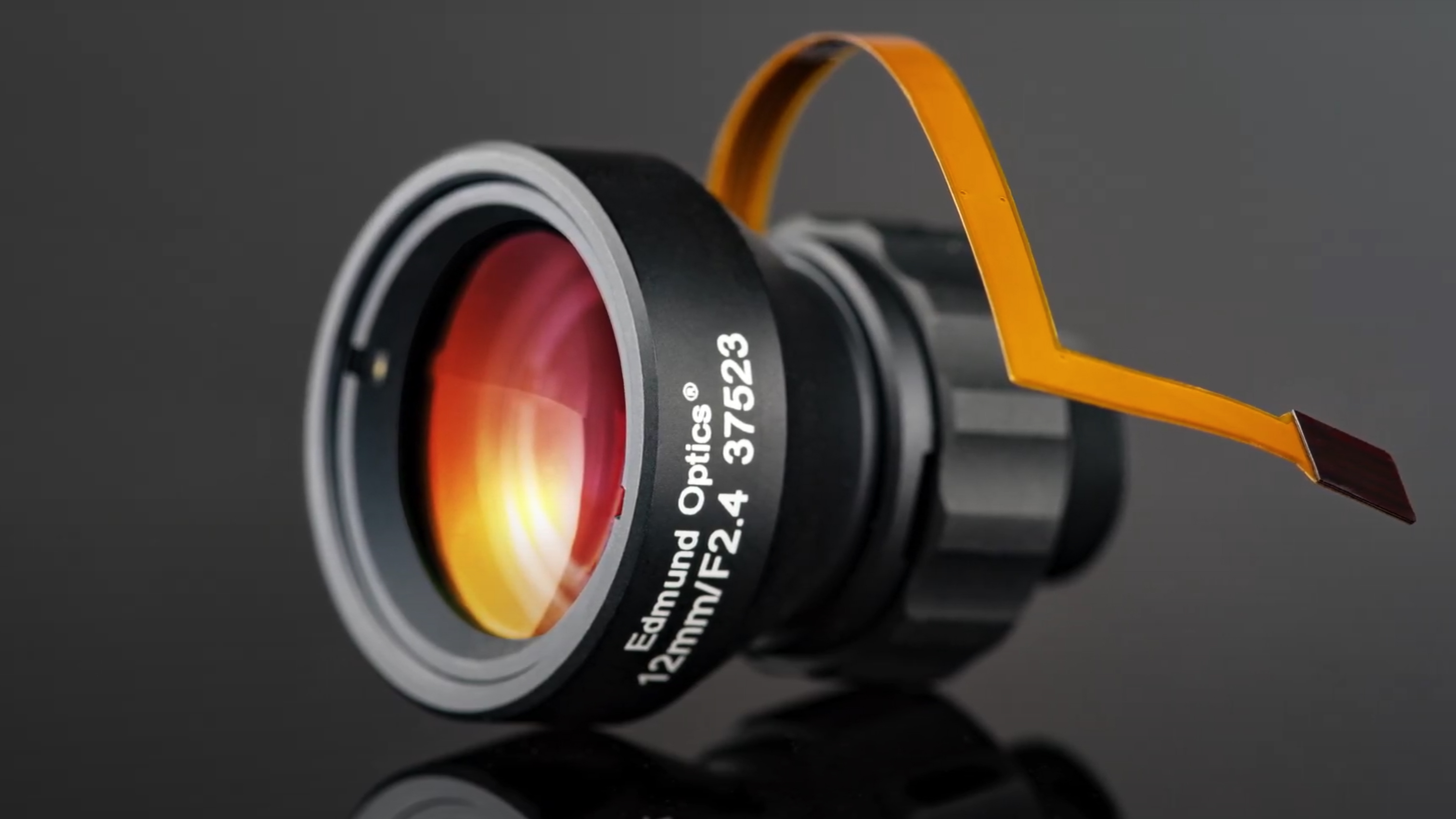 A liquid lens on a grey background