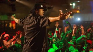 O'Shea Jackson Jr. as Ice Cube in front of a crowd in Straight Outta Compton